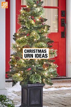 a christmas tree with a sign that says christmas urn ideas