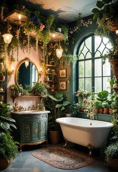 a bath tub sitting next to a window in a bathroom filled with plants and potted plants