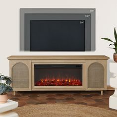 a living room with a fireplace and television on the wall next to potted plants