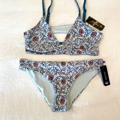 Nwt Tavik Juliet Wildflower Print Bikini Size L. This Bikini Is Such A Staple For The Pool, The Beach, Or A Night Spent In The Jacuzzi. Fitted Floral Print Swimwear With Triangle Top, Fitted Floral Print Triangle Top Swimwear, Floral Print Fitted Tankini With Triangle Top, Fitted Floral Print Triangle Top Tankini, Wildflower Print, The Pool, Womens Swim, Wild Flowers, The Beach