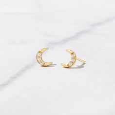 Tiny moon stud earrings! Perfect for a minimalist or for stacking! - - - D E T A I L S - - - * Made of 925 Sterling Silver * We use a THICK, DURABLE plating of 14K Gold, Rose Gold or Rhodium - for a piece that will last you years to come! * Highest Grade CZ for an authentic diamond look! * Nickel-free & Hypoallergenic * Length: 5.4mm ♥︎ ♥︎ ♥︎ Model Details ♥︎ ♥︎ ♥︎ 2nd Hole- https://www.etsy.com/listing/1154500077/tiny-ball-stud-earrings-ball-studs-stud?click_key=772e6d7f7021c5b7e72d2c2498531b61 Dainty Moon-shaped Hypoallergenic Earrings, Dainty Hypoallergenic Moon-shaped Earrings, Dainty Moon Shaped Hypoallergenic Earrings, Dainty Hypoallergenic Moon Earrings, Dainty Crescent Earrings For Everyday, Celestial Half Moon Single Earring, Dainty Moon Shaped Single Earring, Dainty Single Moon Earring, Elegant Hypoallergenic Moon Shaped Earrings