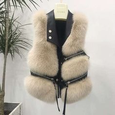 Item Type: Jackets & Coats Gender: Women Material: Faux Fur Collar: Turn-down Collar Sleeve Length: Sleeveless Package Includes: 1 x Vest Size Info: Size Bust (cm / inch) Length (cm / inch) S 100 / 39.37 40 / 15.75 M 104 / 40.94 42 / 16.54 L 108 / 42.52 43 / 16.93 XL 112 / 44.09 44 / 17.32 XXL 116 / 45.67 45 / 17.72 3XL 120 / 47.24 46 / 18.11 Nikki Outfit, Short Fur Coat, Fur Vest Women, Fur Waistcoat, Women Faux Fur Vest, Patio Dress, Ladies Short Jackets, Chaleco Casual, Shoes Outfit Fashion