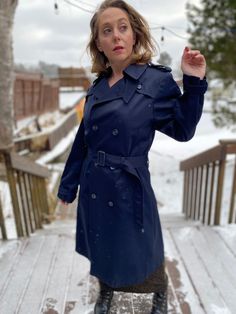 Vintage Navy Blue Classic Trench Coat by Pierre Cardin. Size is 38 T (Tall) Lovely designer trench coat, made well and has the original belt. Longer in the arms and length slightly. Fantastic vintage condition. Measured flat and in inches. Pit to pit - 20 in Waist - 20 in Hips - 22 in Sleeve - 26 in Length shoulder to hem - 46 in Winter Workwear Raincoat, Single-breasted, Winter Workwear Raincoat Single Breasted, Winter Single-breasted Raincoat For Work, Fitted Raincoat For Winter Rainy Weather, Fitted Raincoat For Rainy Winter Weather, Winter Workwear Raincoat With Long Sleeves, Navy Long Sleeve Winter Raincoat, Long Sleeve Raincoat For Winter Workwear, Long Sleeve Raincoat With Button Closure For Work