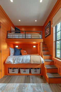 a bedroom with bunk beds and stairs leading to the upper floor, along with two storage bins