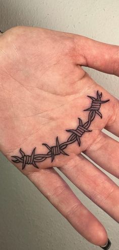 100 Captivating Palm Tattoos for Men and Women - Tattoo Me Now Wrist Tattoos Men Band, Cool Palm Tattoos, Tattoos On Palm Of Hand, Flower Palm Tattoo, Finger Webbing Tattoo, V Shaped Tattoo Design, Palm Tattoos Men, Tattoo Palm Hand, Hand Palm Tattoos For Women