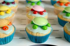 cupcakes decorated with colorful candies and decorations