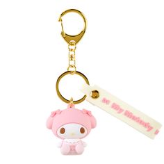 a hello kitty keychain with a name tag attached to it