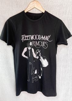 a black t - shirt with the words fleetwood mac rumours printed on it