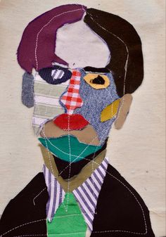 a collage of a man's face made out of different colored pieces of cloth