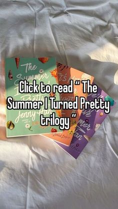 a stack of books sitting on top of a bed next to the caption, click to read the summer i turned pretty trilogy