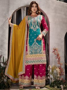 Introducing the glamorous blue & pink embroidered chinon palazzo suit with dupatta from Ethnic Plus! This stunning sky-blue and pink suit is made from high-quality chinon material, ensuring both comfort and durability.
The saree comes in a beautiful sky-blue and pink color combination, perfect for any occasion. The dori work, sequin work, embroidered work, and mirror work add a touch of elegance and glamour to the suit, making you stand out in the crowd. Additionally, the yellow chinon mater South Asian Clothes, Designer Palazzo, Suit With Dupatta, Pink Color Combination, Purple Bottom, Asian Clothes, Black Abaya, Palazzo Suit, Suit Collection