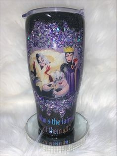 a purple and black glass with the words who's the fairest of them all?