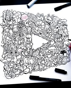 the letter d is made up of many different cartoon characters and symbols on paper with marker pens