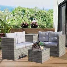 an outdoor furniture set on a wooden deck