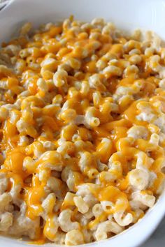 a white bowl filled with macaroni and cheese