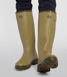 A country classic, the Chasseur wellington boots by Le Chameau are appreciated far beyond the field thanks to their high-performance design. Famed for their reputation as the first style to feature an adjustable, waterproof gusset, they also boast a shock-absorbing outsole, while the neoprene lining provides daylong insulation and warmth. Green Boots Men, Le Chameau Boots, Mens Waterproof Boots, Blazer Cardigan, Green Boots, Steel Toe Work Boots, Wellington Boot, Boots Casual, Wellington Boots