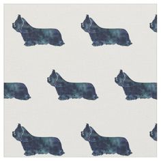 an animal print on white fabric with blue and black dogs in the middle, all facing different directions