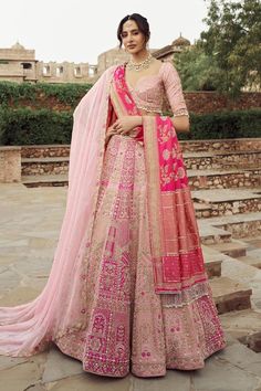 Pink dual toned lehenga with light and dark alternate panels, highlighted with cutdana, pearl and tikki embroidery all over, along with attached cancan. Paired with a padded blouse with floral embroidery and tassel details, a dark pink floral motif embroidered dupatta and a light pink scalloped dupatta with a delicate border.
Components: 4
Pattern: Embroidered
Type Of Work: Cutdana, Pearl, Tikki
Neckline: Sweetheart
Sleeve Type: Elbow
Fabric: Silk, Organza
Color: Pink
Other Details: 
Attached li Annus Creation, Light Pink Lehenga, Mirror Lace, Embroidery Lehenga, Designer Mirror, Organza Lehenga, Pink Lehenga, Wedding Fashion, Indian Ethnic Wear