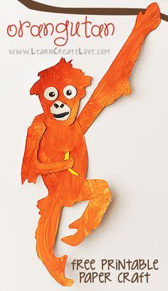 an orangutan hanging on a tree branch with the text free printable paper craft