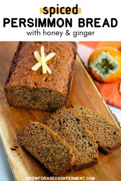 sliced cinnamon bread with honey and ginger on a wooden cutting board next to oranges