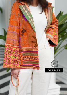 Hand crafted TOPS at DIPDAZ SETS Discover the perfect blend of tradition and contemporary fashion with our Afghan Modern Style Handmade Collared Top. This exquisite piece is a testament to the rich cultural heritage of Afghanistan, meticulously crafted by skilled artisans to bring you an authentic and stylish garment. Features: Handmade Excellence: Each top is handcrafted with attention to detail, ensuring a unique and high-quality piece.  Modern Design: The top features a modern silhouette with Collared Top, Intricate Embroidery, Cultural Heritage, Modern Fashion, Contemporary Fashion, Traditional Dresses, Formal Occasion, Clothing Items, Breathable Fabric