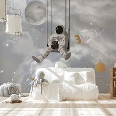 an astronaut themed bedroom with space theme