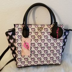 Original Betsy, Fun & Sophisticated Shoulder Bag With Strap, Nicely Lined Bag With Kitty Cat Tab On Strap . A Zipper Close And Gold Linked Chain Attached To Strap. One Inside Inner Pocket. Hard Wearing , Made Of Synthetic Vegan Leather. Betsey Johnson Purses Handbags, Pink Heart Print Bags For Everyday Use, Pink Heart Print Bag For Everyday Use, Pink Rectangular Bag With Heart Print, Pink Heart Print Bag For Daily Use, Valentine's Day Pink Tote Shoulder Bag, Valentine's Day Everyday Top Handle Bag, Chic Pink Heart-shaped Bag, Trendy Everyday Shoulder Bag With Heart Print