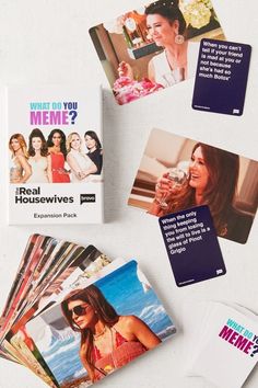 the real housewives card game is on display with its matching cards and booklets