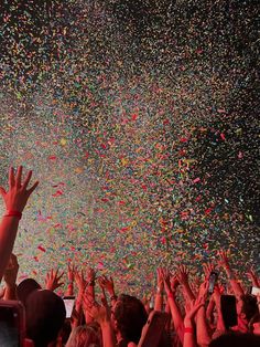 confetti is thrown in the air at a concert