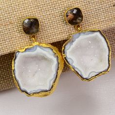 Thank you for coming in! Stunning one-of-a-kind 18k gold vermeil earrings with a beautiful pair of druzy geode and smoky quartz! 95.80 carats total weight~! You'll get the earrings you see! SIZE: 24.5mmx37.5mm Material: 18k gold vermeil, Druzy Geode, Smoky Quartz Freshwater Pearl Drop Earrings, Geode Earrings, Wedding Jewelry Earrings, Fine Jewellery Earrings, Pearl Drop Earrings, Pearl Drop, Smoky Quartz, Wedding Earrings, Spacer Beads