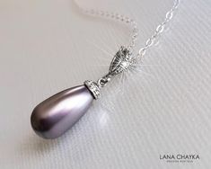 Wedding Mauve Light Purple Lilac Teardrop Pearl Pendant Necklace with .925 Sterling Silver Chain. PLEASE READ ITEM DESCRIPTION and SHOP POLICIES before placing your order, and contact me with any questions! CHAIN is 18 inches (45.7cm) long. PENDANT is about 1.06 inch (2.7cm) long including bail. MATCHING EARRINGS (Pic.#7): https://www.etsy.com/listing/1269024687/mauve-pearl-earrings-wedding-lilac?click_key=4b785c4b6e052c32fd284c98a390438aac37d31a%3A1269024687&click_sum=4e422ba8&ref=shop_home_act Formal Silver Bridal Necklace Pear Shaped, Silver Pear-shaped Bridal Necklace For Formal Occasions, Formal Silver Pear-shaped Bridal Necklace, Silver Bridal Necklace With Pear Shape As Gift, Silver Pear-shaped Bridal Necklace Gift, Classic Silver Drop Bridal Necklace, Silver Drop Bridal Necklace For Formal Occasions, Silver Bridal Necklace With Pearl Drop For Formal Occasions, Teardrop Pearl Pendant Necklace For Wedding