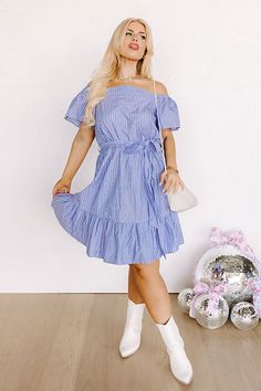 Plus Size - You are sure to look simply supreme in this stunning sky blue dress featuring lightweight breezy material patterned with white accent stripes, a straight elastic neckline with short sleeves that can be worn on or off the shoulder, a tie belt waistline, and a flattering silhouette that falls into a peplum bottom with an uneven knee-length hemline! Measurements 1XL : Bust 36", Hip 40", Length 34", Sleeve Length 7.5", Waist 28-32". 2XL : Bust 38", Hip 42", Length 34.5", Sleeve Length 8" Blue Off Shoulder Dress For Summer Day Out, Blue Off-shoulder Dress For Summer Day Out, Blue Off-shoulder Dress For A Summer Day Out, Casual Blue Off-shoulder Dress For Day Out, Blue Off-shoulder Casual Dress For Vacation, Casual Blue Off Shoulder Dress For Spring, Blue Short Sleeve Off Shoulder Summer Dress, Blue Off Shoulder Short Sleeve Dress For Summer, Blue Off Shoulder Dress With Short Sleeves For Summer