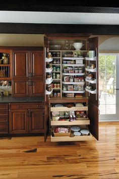 an open pantry with lots of food in it