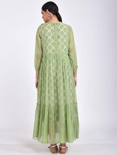 A delicate chanderi fit and flare-tiered long dress with 3/4th sleeves and flouncy hemline. The dress comes with a block printed offwhite soft cotton slip Features: Handwoven and hand block printed. 100% cotton silk fabric Handmade in India Garment measurements (in Inches): Size XS : Bust-34", Waist-Flared", Hip-Flared, Length-52" Size S : Bust-36", Waist-Flared", Hip-Flared, Length- 52" Size M : Bust-38", Waist-Flared", Hip-Flared, Length- 52" Size L : Bust-40", Waist-Flared", Hip-Flared, Lengt Cotton Silk Fabric, Cotton Slip, Silk Maxi, Silk Maxi Dress, Dress Set, Green Cotton, Cotton Silk, Silk Fabric, Set Dress