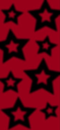 black and red stars on a red background