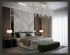 a bedroom with a large bed and chandelier hanging from the ceiling