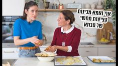 two women standing in a kitchen preparing food with words above them that read, let's eat together