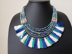 Colorful beaded fringe necklace with silk tassels. Perfect for vacation or resort wear. Sparkly silver color beads catch the light and dress it up. Perfect for day or night, Excellent quality. Shop more necklaces: https://www.etsy.com/shop/BoutiqueByMaryam?section_id=21694658 Shop BoutiqueByMaryam: https://www.etsy.com/shop/boutiquebymaryam Resort Jewelry, Vacation Jewelry, Silk Tassels, Thread Necklace, Afghan Jewelry, Chain Fringe, Necklace Colorful, Jewelry Summer, Types Of Gifts