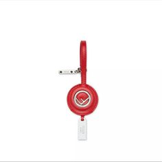 a red headphone with a white tag attached to it