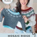 a woman holding up a knitted sweater with the words mosaic ridge written on it