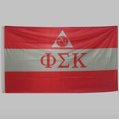 a red and white flag with the letters phik on it's bottom corner