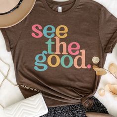 Look great and feel comfortable while inspiring others with this fun, colorful design. God Shirts, Heather Storm, Women Of The Bible, Bible Verse Wall Decor, See The Good, Lion Of Judah, Personalised Canvas, Timeless Gifts, Women's T Shirts