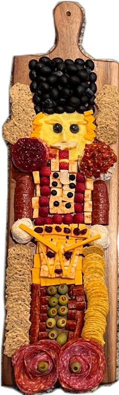 a wooden cutting board topped with lots of food