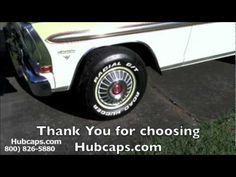 a white car parked on the side of a road with words thank you for choosing hubcaps com