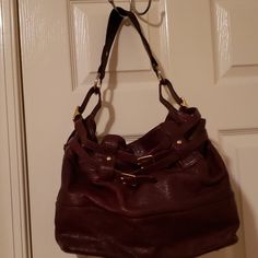 Very Gently Used .Once?Excellent Cond.Bordeaux Is Ths Color.On Inner Zip Pocket And Two Others .Snap Closure.Single Handle.1015 .Strap 9"Drop Designer Burgundy Shoulder Bag With Branded Hardware, Designer Burgundy Shoulder Bag For Shopping, Chic Burgundy Shoulder Bag With Branded Hardware, Office Burgundy Shoulder Bag With Gold-tone Hardware, Burgundy Shoulder Bag With Gold-tone Hardware For Office, Designer Burgundy Satchel For Shopping, Burgundy Shoulder Bag With Gold-tone Hardware For Shopping, Burgundy Satchel With Adjustable Strap For Formal Occasions, Elegant Burgundy Leather Hobo Bag