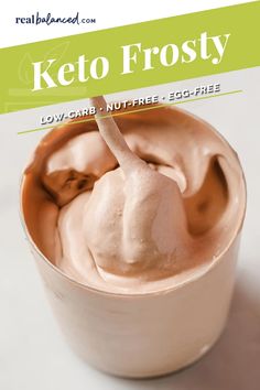 a close up of a bowl of food with a spoon in it and the words keto frosty on top