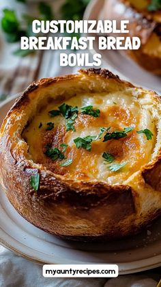 baked bread bowls on a plate with text overlay that reads, customizable breakfast bread bowls