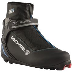 a pair of black ski boots with blue and red trims on the bottom part