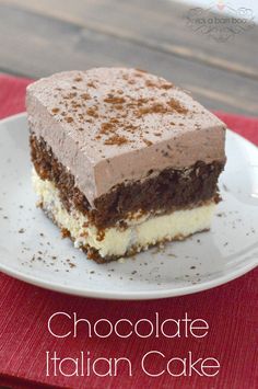 a piece of chocolate italian cake on a white plate with the words chocolate italian cake above it