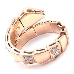 two rose gold bracelets with diamonds on the sides and one has a clasp in the middle